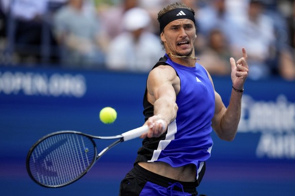 Alexander Zverev, of Germany, returns a shot to Taylor Fritz, of the United States, during the quarterfinals of the U.S. Open tennis championships, Tuesday, Sept. 3, 2024, in New York. (AP Photo/Kirst ...