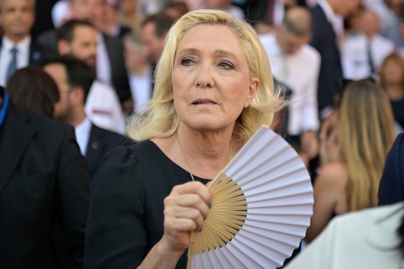 epa13110992 Far-right leader Marine Le Pen arrivess to attend the 10th anniversary of the deadly 2016 truck attack in Nice, southern France, 14 July 2026. On 14 July 2016, a 19-tonne refrigerated carg ...
