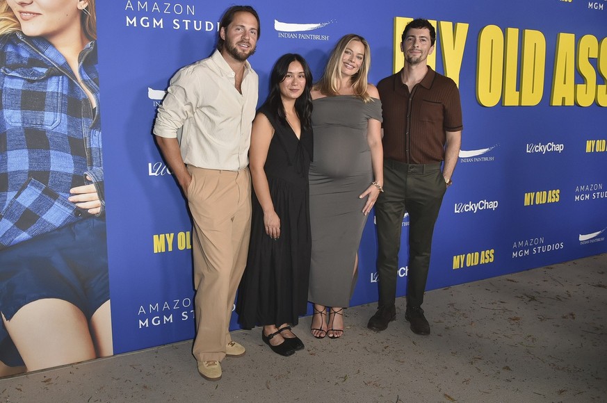 Tom Ackerley, from left, Bronte Payne, Margot Robbie, and Josey McNamara arrive at the premiere of &quot;My Old Ass&quot; at Tree People on Monday, Sept. 9, 2024, in Beverly Hills, Calif. (Photo by Ri ...