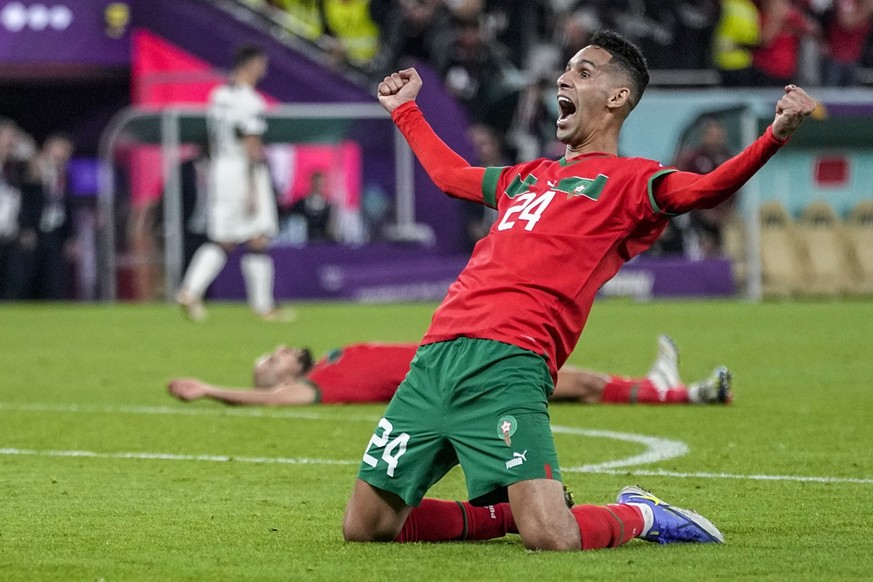Morocco&#039;s Bilal El Khannous celebrates at the end of the match his team victory during the World Cup quarterfinal soccer match between Morocco and Portugal, at Al Thumama Stadium in Doha, Qatar,  ...