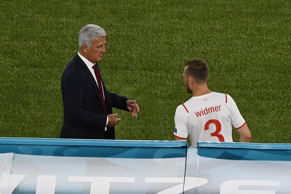 Switzerland&#039;s manager Vladimir Petkovic gestures with Silvan Widmer during the Euro 2020 soccer championship group A match between Italy and Switzerland at the Rome Olympic stadium, Wednesday, Ju ...
