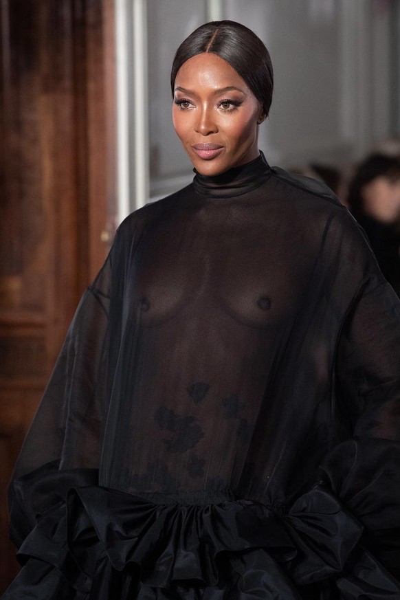 epa07313546 British model Naomi Campbell presents a creation from the Spring/Summer 2019 Haute Couture collection by Valentino fashion house during the Paris Fashion Week, in Paris, France, 23 January ...