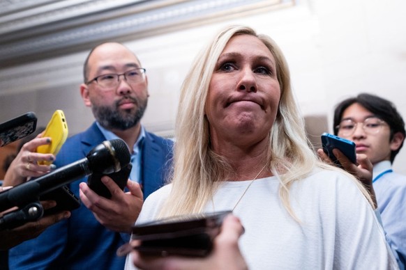 WASHINGTON - OCTOBER 13: Rep. Marjorie Taylor Greene, R-Ga., speaks to reporters as she leaves the House Republicans&#039; caucus meeting for a members only discussion on electing a new Speaker of the ...
