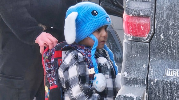 Liam Conejo Ramos, 5, is detained by U.S. Immigration and Customs Enforcement officers after arriving home from preschool, Tuesday, Jan. 20, 2026, in a Minneapolis suburb. (Ali Daniels via AP)
Immigra ...