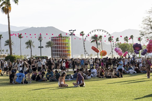 Festivalgoers are seen during the first weekend of the Coachella Valley Music and Arts Festival at the Empire Polo Club on Sunday, April 13, 2025, in Indio, Calif. (Photo by Amy Harris/Invision/AP)
20 ...