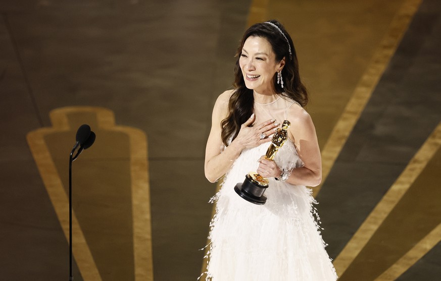 epa10519092 Michelle Yeoh after winning the Oscar for Best Actress for &#039;Everything Everywhere All at Once&#039; during the 95th annual Academy Awards ceremony at the Dolby Theatre in Hollywood, L ...