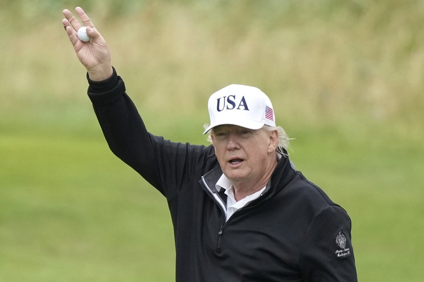 President Donald Trump waves as he plays golf at the Trump Turnberry golf course in Turnberry, Scotland, Sunday, July 27, 2025.(AP Photo/Alastair Grant)
Trump Scotland
