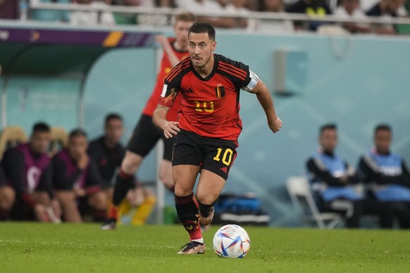 Belgium&#039;s Eden Hazard runs with the ball during the World Cup group F soccer match between Belgium and Morocco, at the Al Thumama Stadium in Doha, Qatar, Sunday, Nov. 27, 2022. (AP Photo/Frank Au ...