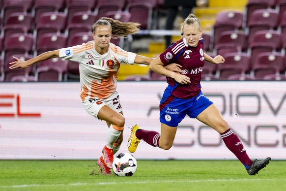 Roma&#039;s midfielder Frederikke Thogersen, left, fights for the ball with Servette&#039;s forward Cassandra Korhonen, right, during the Women&#039;s Champions League Round 2, second leg soccer match ...