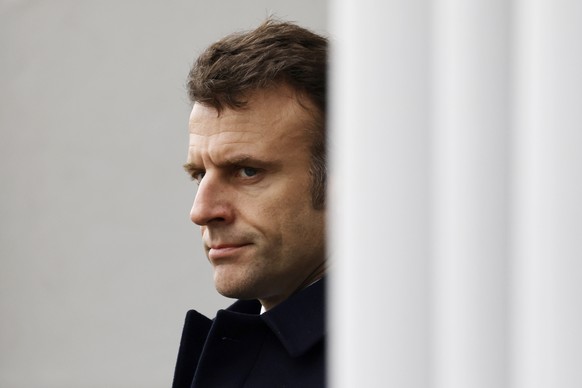 French President Emmanuel Macron attends a ceremony in tribute to French GIGN gendarme Marechal des Logis-Chef Arnaud Blanc, who was killed in an operation against illegal gold mining in French Guiana ...