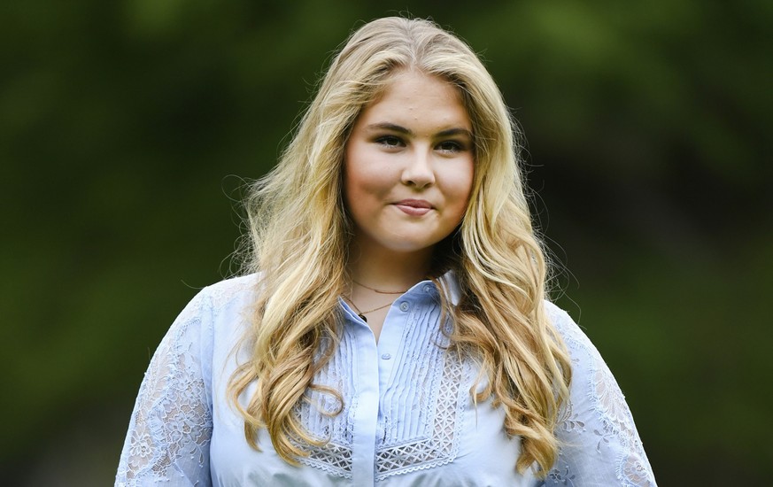 FILE - Netherlands' Princess Amalia poses in the garden of royal palace Huis ten Bosch in The Hague, Netherlands, Friday, July 17, 2020. People in the Netherlands could get to know their future q ...