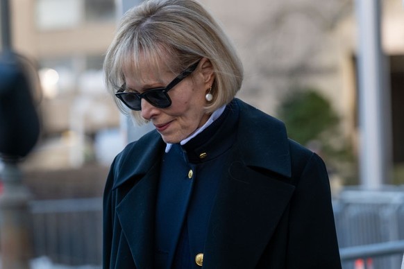 NEW YORK, NEW YORK - JANUARY 22: E. Jean Carroll leaves Manhattan federal court in New York as her defamation suit against former president Donald Trump has been postponed after a juror and one of Tru ...