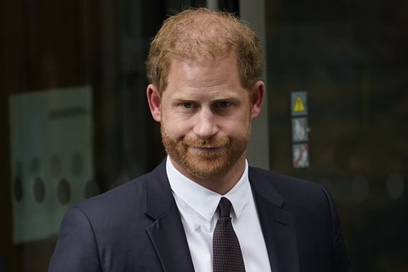 FILE - Prince Harry leaves the High Court after giving evidence in London, Tuesday, June 6, 2023. A judge ordered Prince Harry on Monday, Dec. 11, 2023, to pay nearly 50,000 pounds (over $60,000) in l ...