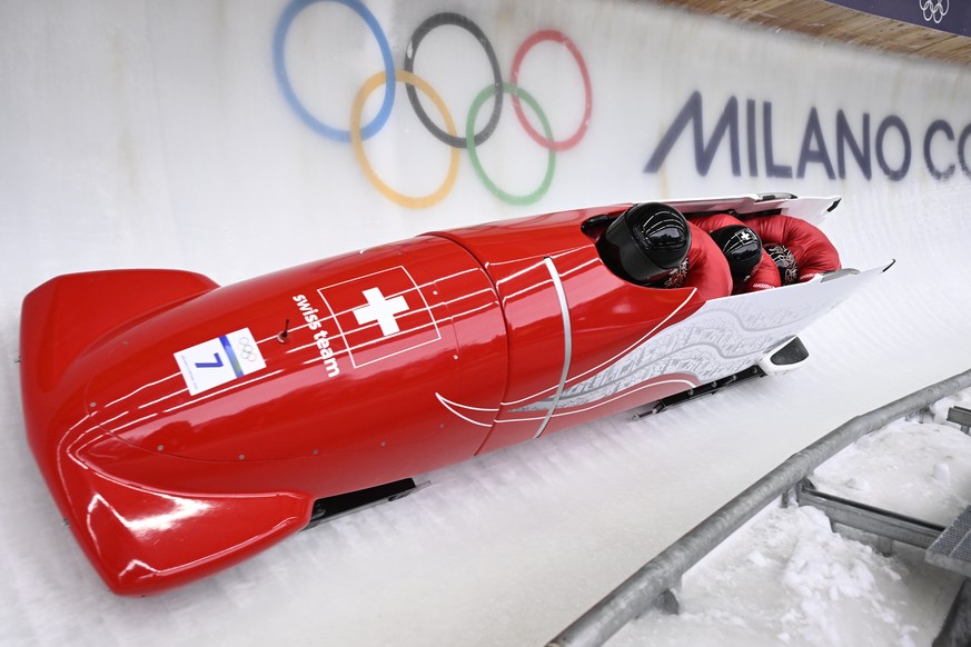 epa12767736 Michael Vogt, Andreas Haas, Amadou David Ndiaye, and Mario Aeberhard of Switzerland compete in the 4-Man of the Bobsleigh competitions at the Milano Cortina 2026 Winter Olympic Games, in C ...