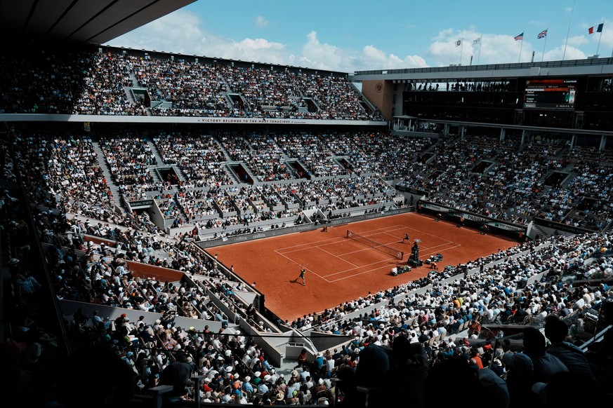 FILE - The crowd watch Norway's Casper Ruud playing against Spain's Rafael Nadal on the court Philippe Chatrier, known as center court, during their final match of the French Open tennis tou ...