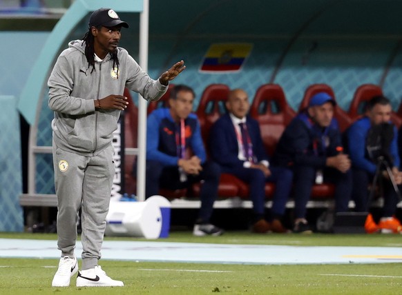 epa10336534 Head coach Aliou Cisse of Senegal﻿ during the FIFA World Cup 2022 group A soccer match between Ecuador and Senegal at Khalifa International Stadium in Doha, Qatar, 29 November 2022. EPA/Ro ...