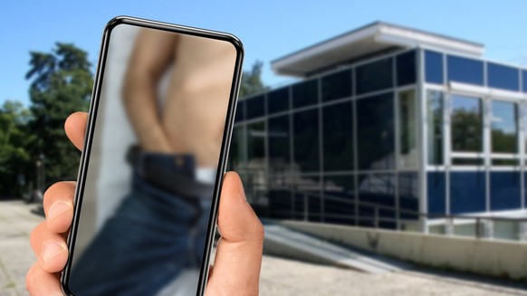 Smartphone with a Pornhub logo. Pornhub is a pornographic video sharing and pornography website. Moscow, Russia - February 21, 2022.