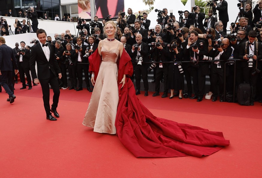 Uma Thurman poses for photographers upon arrival at the opening ceremony and the premiere of the film 'Jeanne du Barry' at the 76th international film festival, Cannes, southern France, Tues ...