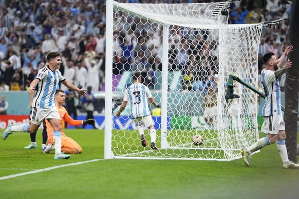 Argentina&#039;s Julian Alvarez, left, and Lionel Messi celebrate third goal during the World Cup semifinal soccer match between Argentina and Croatia at the Lusail Stadium in Lusail, Qatar, Tuesday,  ...