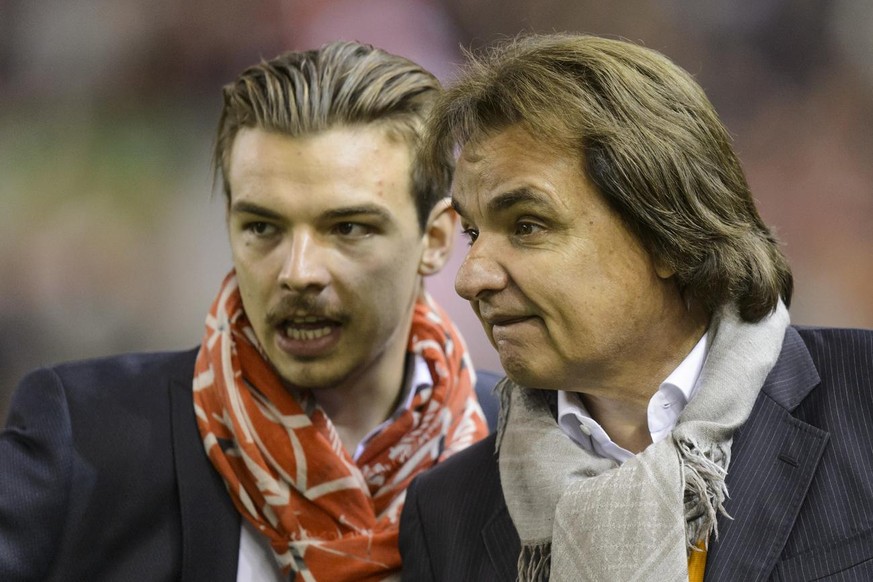 Sion&#039;s President, Christian Constantin, right, reacts next to Sion&#039;s team manager, Barthelemy Constantin, left, during the UEFA Europa League group B soccer match between FC Liverpool and FC ...