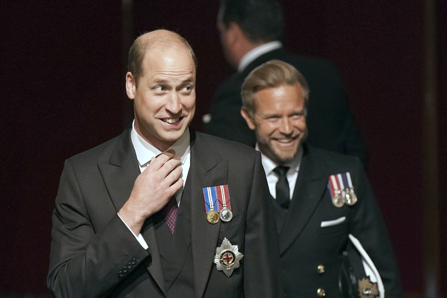 Britain&#039;s Prince William, left, leaves after the State Opening of Parliament in the House of Lords at the Palace of Westminster, in London, Tuesday, May 10, 2022. Britain���s Parliament is openin ...