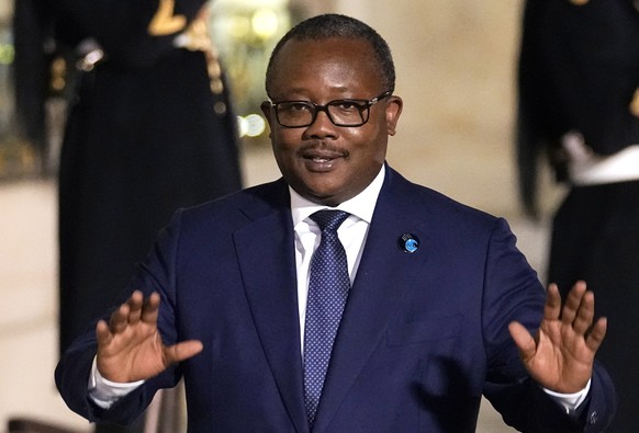 FILE - President of Guinea-Bissau Umaro Sissoco Embalo arrives for a dinner at the Elysee Palace as part of the Paris Peace Forum, in Paris, Nov. 11, 2021. Heavy gunfire erupted Tuesday Feb. 1, 2022 n ...