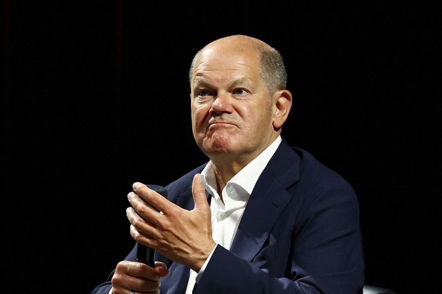 Germany Chancellor Olaf Scholz takes part in a panel discussion entitled &quot;Strengthening community - shaping society. Our responsibility for democracy&quot; at the Erfurt Theater as he visits the  ...