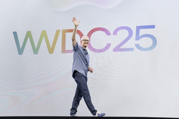 epa12166636 Apple CEO Tim Cook acknowledges the crowd while walking on stage during the 2025 Apple Worldwide Developers Conference (WWDC) on the campus of Apple Park in Cupertino, California, USA 09 J ...