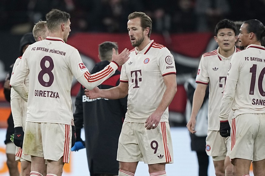 Bayern&#039;s Leon Goretzka, left, Bayern&#039;s Harry Kane, centre, Bayern&#039;s Kim Min-jae, Bayern&#039;s Leroy Sane, right, react after the German Bundesliga soccer match between Bayer Leverkusen ...