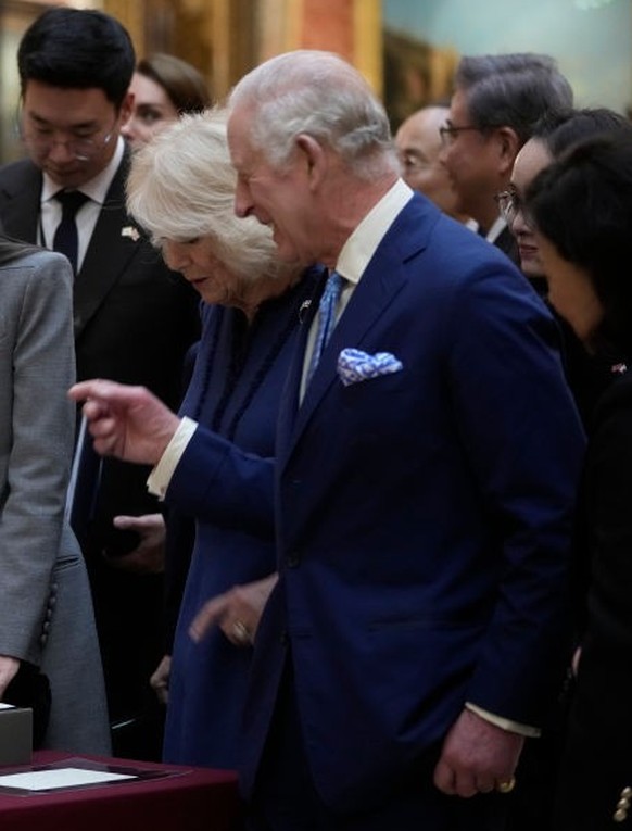 LONDON, ENGLAND - NOVEMBER 21: King Charles III with Queen Camilla shows The President of Korea Yoon Suk Yeol and First Lady, Kim Keon Hee a display of Korean items from the Royal Collection, inside B ...