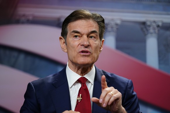 FILE - Mehmet Oz takes part in a forum for Republican candidates for U.S. Senate in Pennsylvania at the Pennsylvania Leadership Conference in Camp Hill, Pa., April 2, 2022. Millionaire candidates and  ...