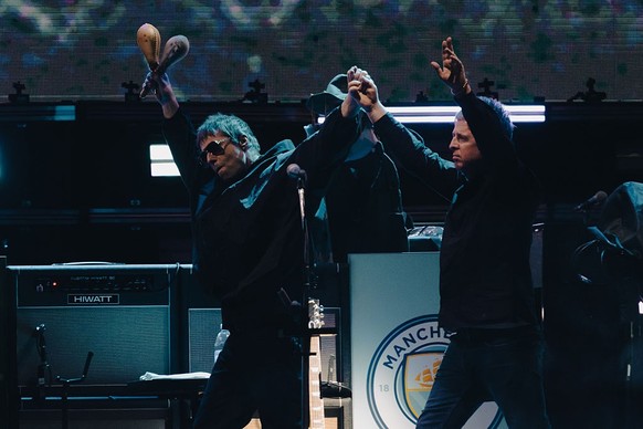 SYDNEY, AUSTRALIA - NOVEMBER 07 2025: Liam and Noel Gallagher of British band Oasis walk together on stage to perform as part of their Live '25 global tour in Sydney Australia (Photo credit shoul ...