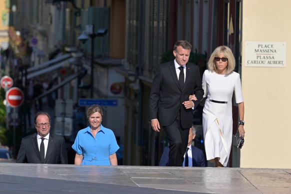 epa13111023 French President Emmanuel Macron, his wife Brigitte Macron, Former French French President Francois Hollande (L), and President of the French National Assembly Yael Braun-Pivet, arrive to  ...