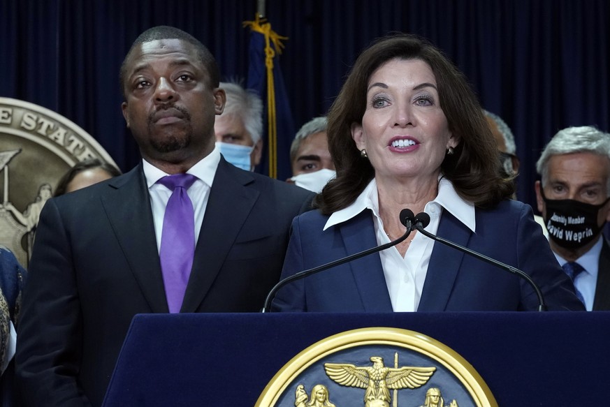FILE �?? New York Gov. Kathy Hochul, accompanied by Lt. Gov. Brian Benjamin, left, speaks during ceremonies in the governor&#039;s office, in New York, Sept. 17, 2021. Benjamin, whose seven months in  ...
