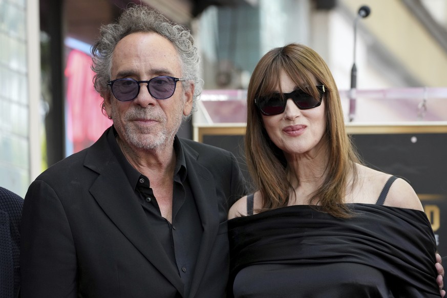 Tim Burton, left, and Monica Bellucci attend a ceremony honoring Burton with a star on the Hollywood Walk of Walk of Fame on Tuesday, Sept. 3, 2024, in Los Angeles. (Photo by Jordan Strauss/Invision/A ...