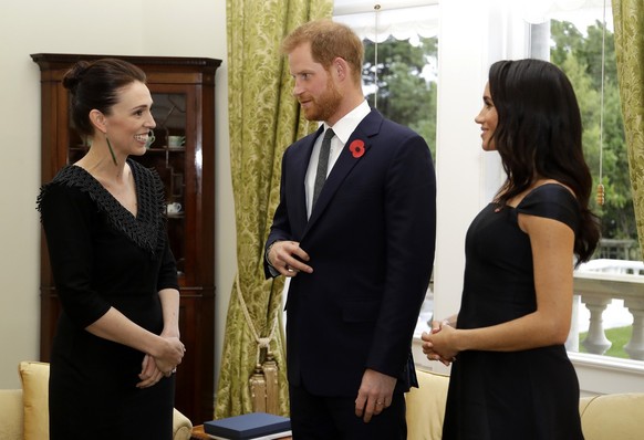 Britain&#039;s Prince Harry and Meghan, Duchess of Sussex meet New Zealand Prime Minister Jacinda Ardern, left, at Government House in Wellington, New Zealand, Sunday, Oct. 28, 2018. Prince Harry and  ...