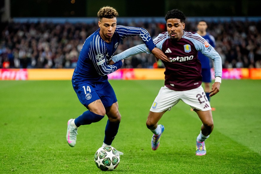 Aston Villa v Paris Saint-Germain Champions League 15/04/2025. Quarter Final leg 2 of 2 Paris Saint-Germain midfielder Desire Doue 14 battles for possession with Aston Villa defender Ian Maatsen 22 du ...