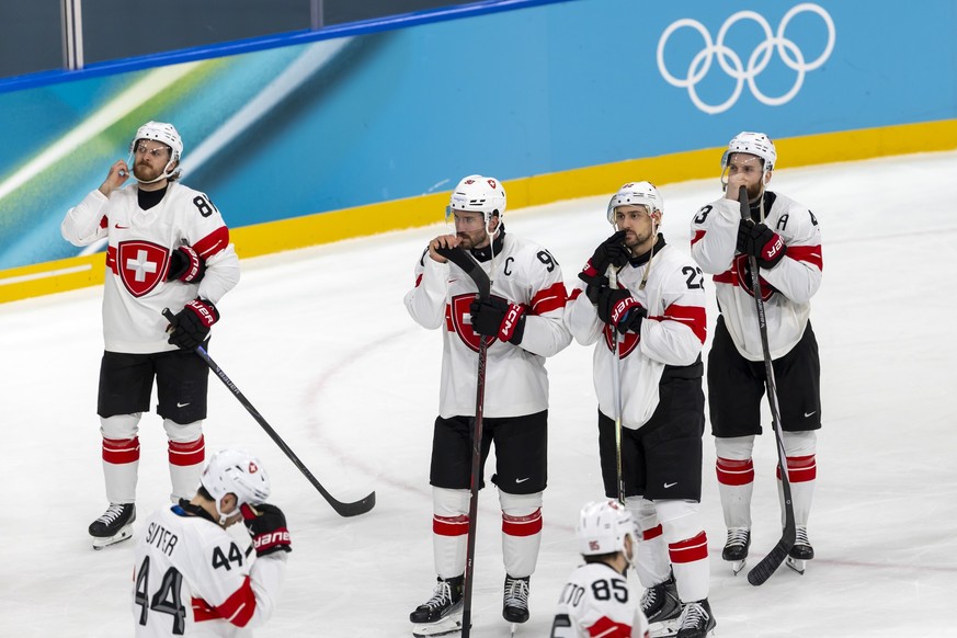 From to left, Switzerland's players Christoph Bertschy, Pius Suter, Roman Josi, Sven Andrighetto, Nino Niederreiter and Andrea Glauser, look disappointed after losing against Finland during the o ...