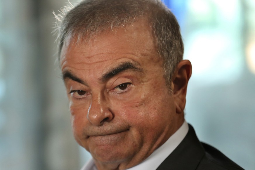 FILE - Nissan's former chairman Carlos Ghosn speaks during an interview with The Associated Press, in Dbayeh, north of Beirut, Lebanon on May 25, 2021. A Tokyo court will hand down a verdict Thur ...