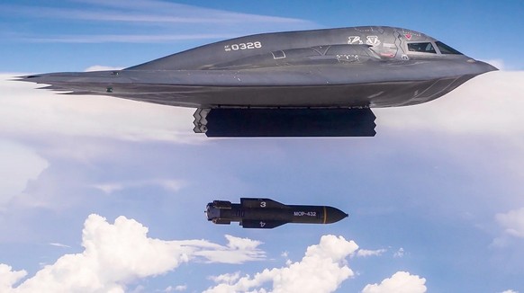 bombardiers furtifs B-2 largue une bombe GBU-57.