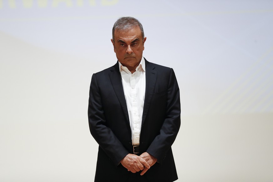 FILE - In this Sept. 29, 2020, file photo, former Nissan chairman Carlos Ghosn stands during a news conference at the Holy Spirit University of Kaslik, north of Beirut, Lebanon. Ghosn has backed his f ...