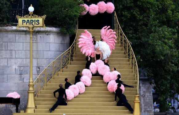 PARIS, FRANCE - JULY 26: American Singer-Songwriter Lady Gaga performs at Square Barye during the athletes’ parade on the River Seine during the opening ceremony of the Olympic Games Paris 2024 on Jul ...