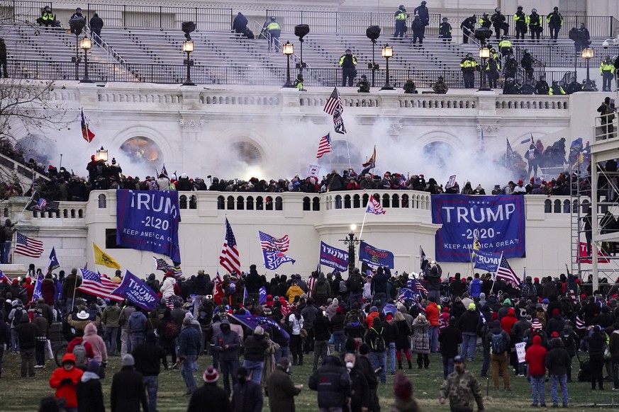 FILE - Violent insurrectionists loyal to President Donald Trump, storm the Capitol, Jan. 6, 2021, in Washington. An original script for Donald Trump���s speech the day after the Capitol insurrection i ...