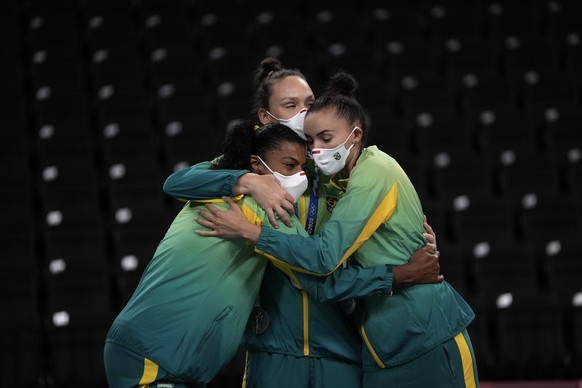 Players from Brazil react on the podium after winning the silver medal in women&#039;s volleyball at the 2020 Summer Olympics, Sunday, Aug. 8, 2021, in Tokyo, Japan. (AP Photo/Manu Fernandez)