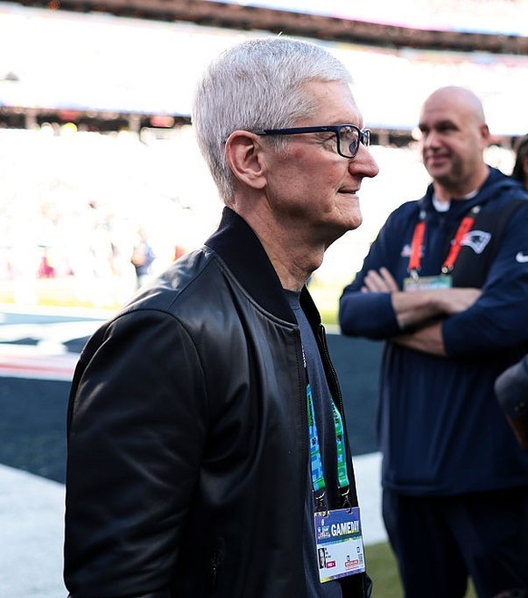 SANTA CLARA, CALIFORNIA - FEBRUARY 08: CEO of Apple Tim Cook walks on the field prior to Super Bowl LX between the New England Patriots and the Seattle Seahawks at Levi's Stadium on February 08,  ...