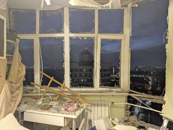 This photo released by Moscow Region Governor Andrei Vorobyev official telegram channel shows a damaged apartment on the site where a shot down Ukrainian drone fell, outside Moscow, Russia, on Tuesday ...