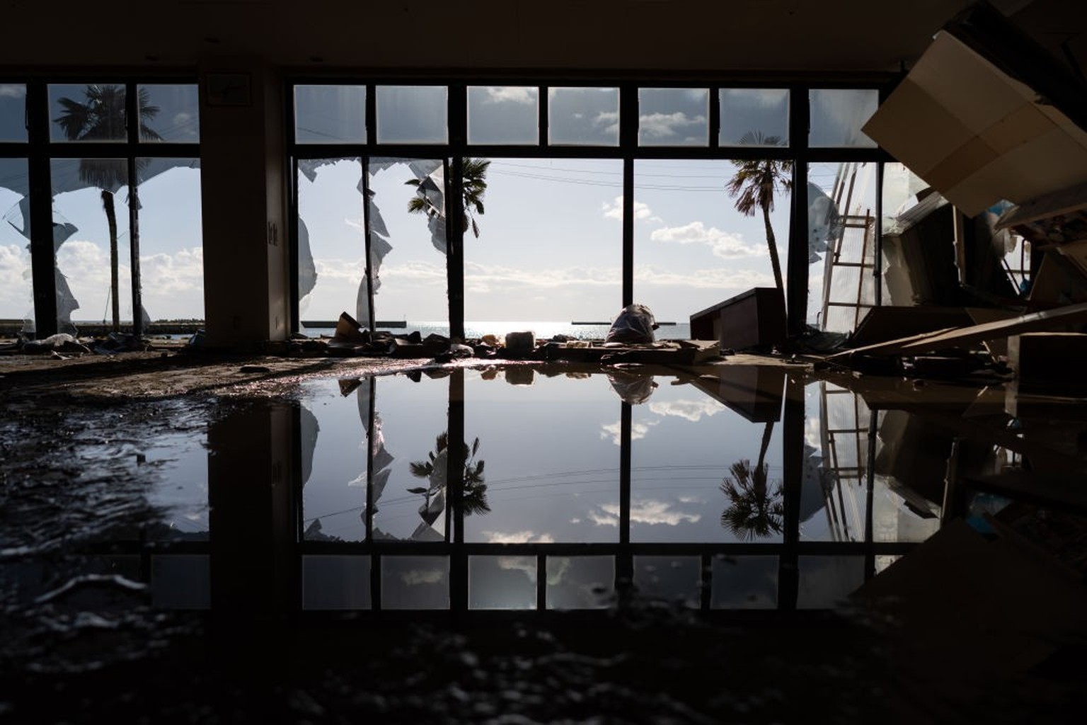 SUZU, JAPAN - JANUARY 04: The damaged interior of a supermarket that was hit by a tsunami following an earthquake is seen January 04, 2024 in Suzu, Japan. A series of major earthquakes have reportedly ...