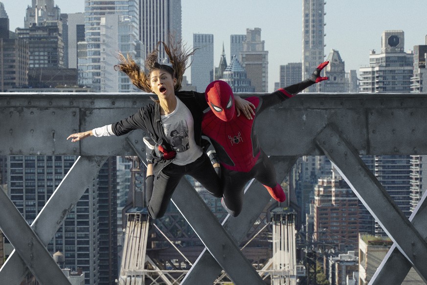 This image released by Sony Pictures shows Zendaya, left, and Tom Holland in Columbia Pictures&#039; &quot;Spider-Man: No Way Home.&quot; (Sony Pictures via AP)