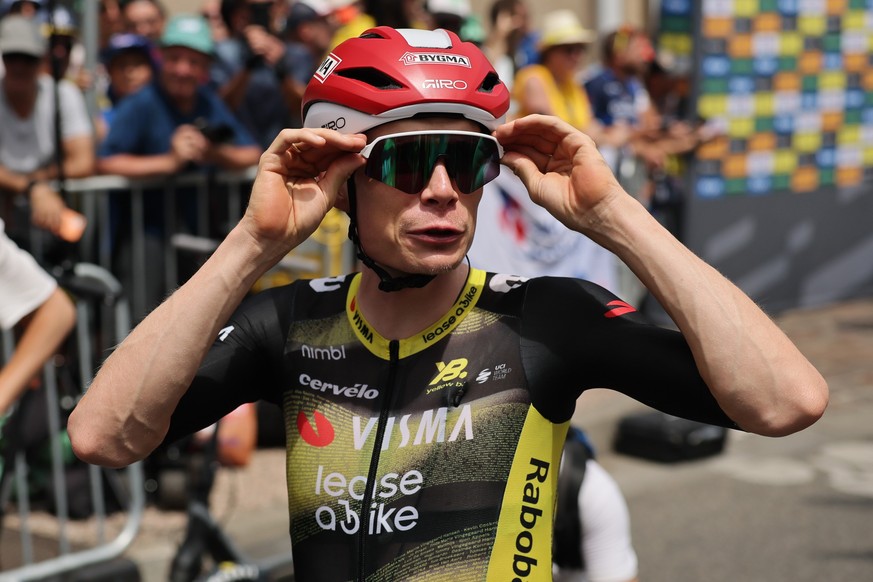 epa12249111 Danish rider Jonas Vingegaard of Team Visma-Lease a Bike stands during the 15th stage of the Tour de France cycling race over 169.3km from Muret to Carcassonne, France, 20 July 2025. EPA/C ...
