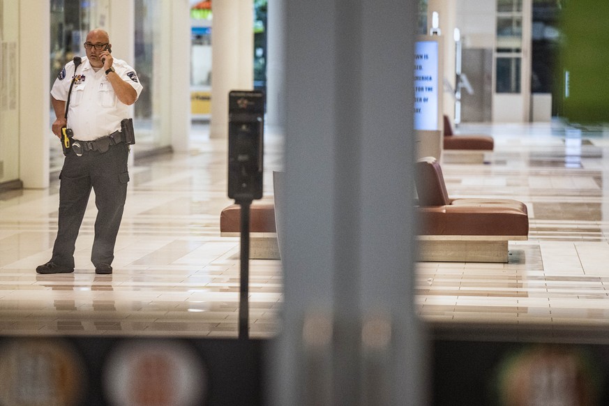 Shoppers are finally allowed to leave the Mall of America after a lockdown of several hours in Bloomington, Minn., on Thursday, Aug. 4, 2022. Police in Minnesota confirm that gunshots were fired at th ...